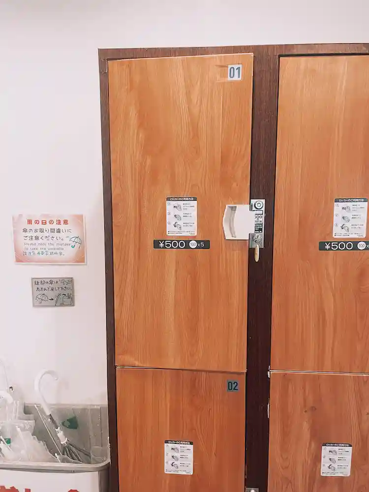 Two woodern coin lockers in a room
