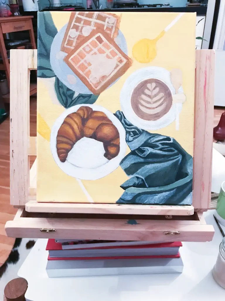 Layering highlights on the croissant and adding detail to the waffles