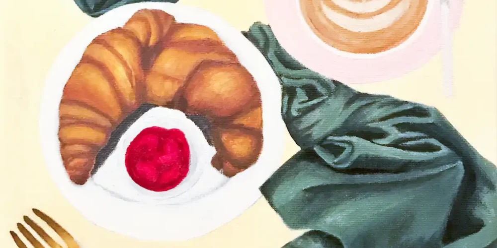 Close-up of painting of croissant showing brush strokes and texture